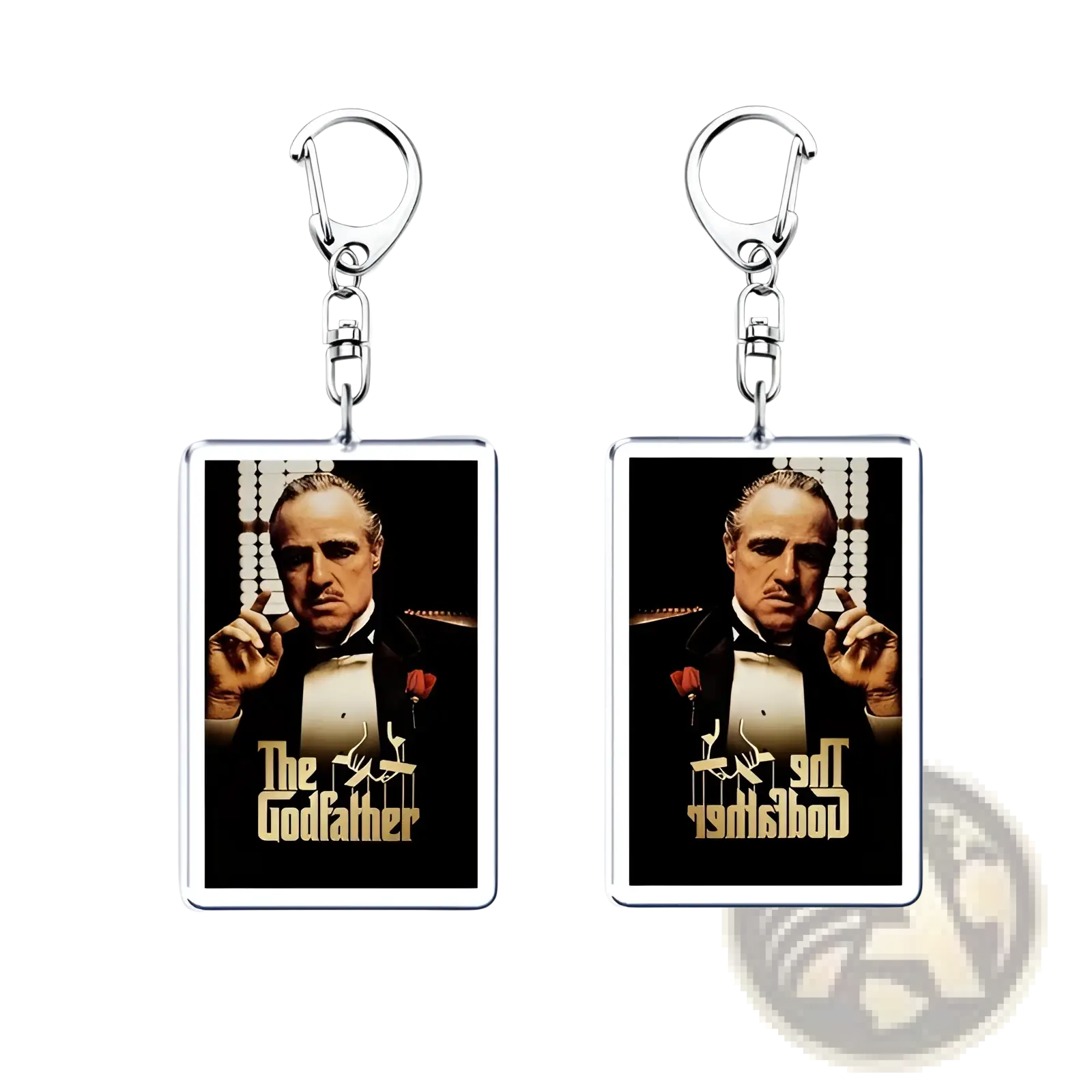 Rectangular acrylic keychain featuring the godfather movie poster with gold lettering on a black background