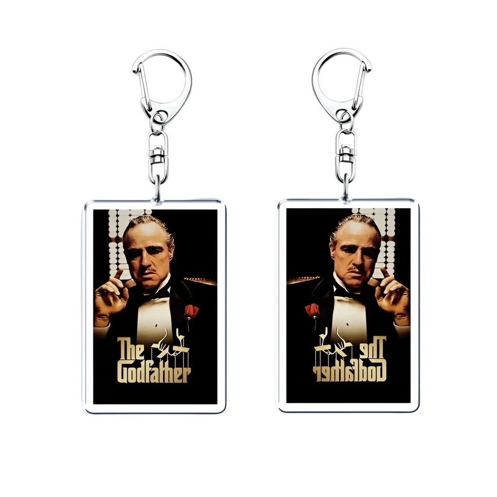Rectangular acrylic keychain featuring the godfather movie poster with gold lettering on a black background