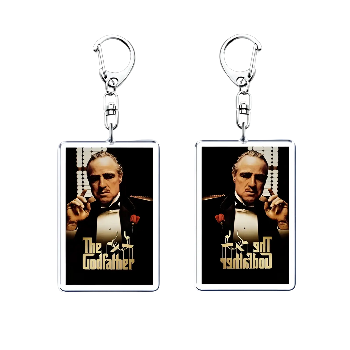 Rectangular acrylic keychain featuring the godfather movie poster with gold lettering on a black background