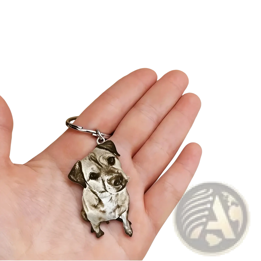 Silver-colored custom photo engraved dog keychain stainless steel with finely detailed 3d black and tan dog portrait