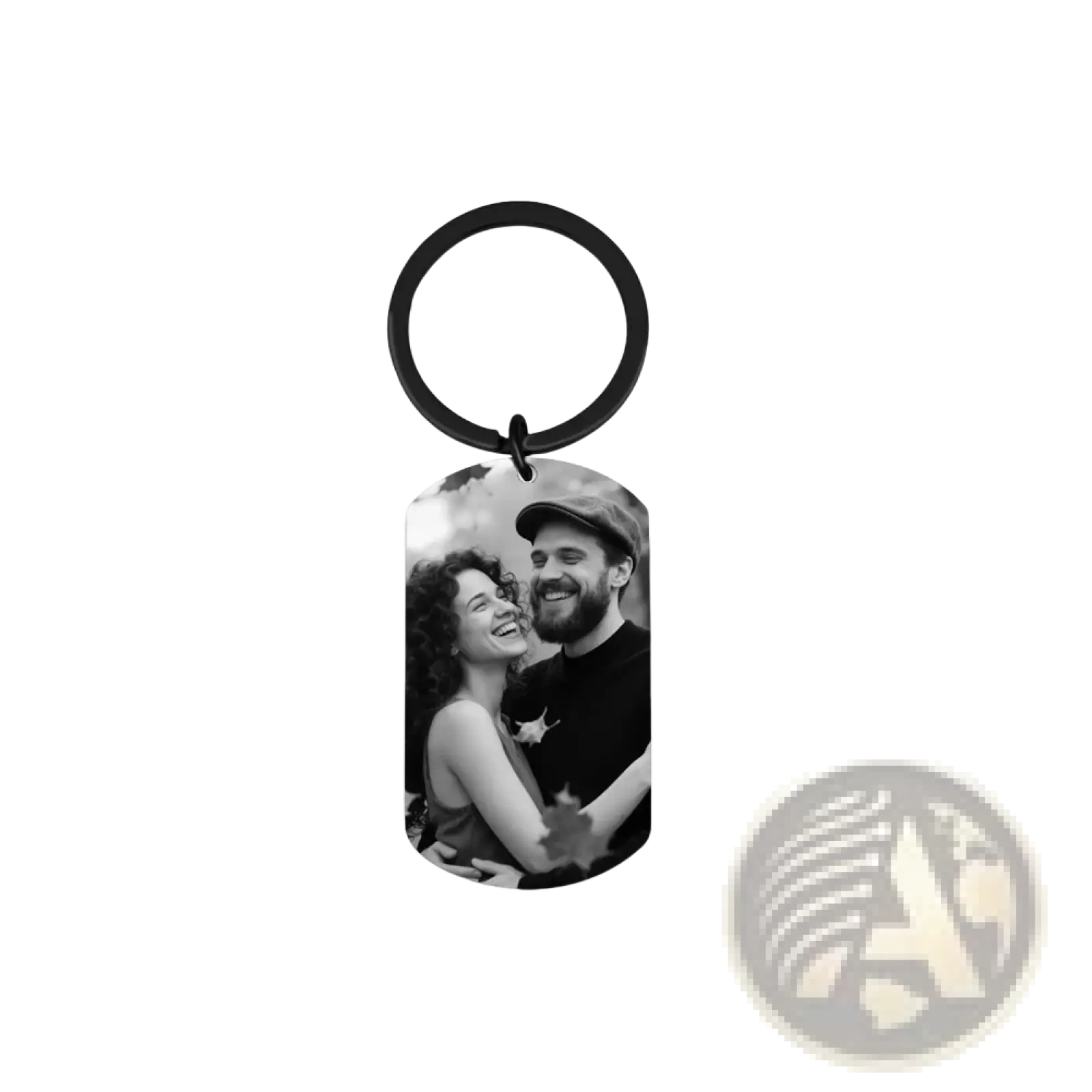 Black metal dog tag keychain with a black-and-white photo of a smiling couple for custom photo keychain for couples