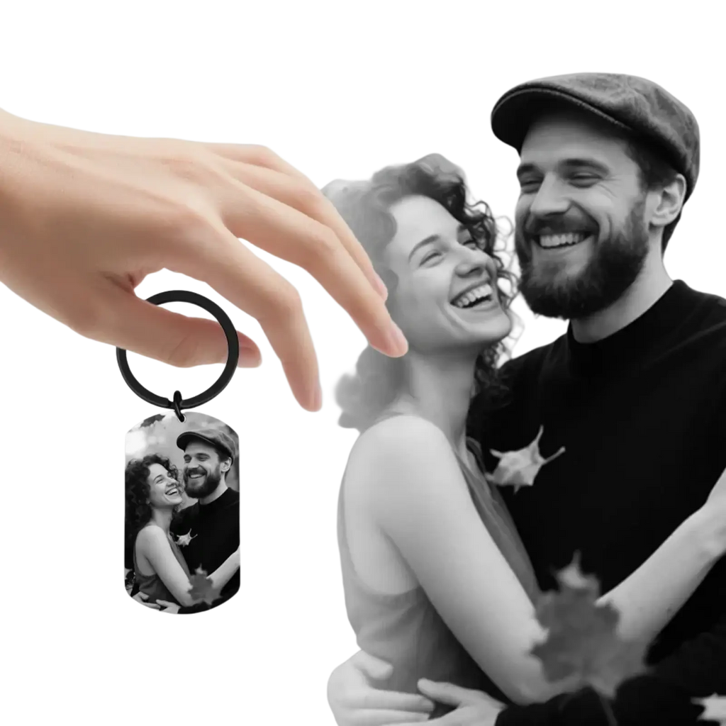 Black metal dog tag keychain featuring a personalized photo of a smiling couple for custom photo keychain for couples
