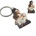 Custom photo keychain featuring a glossy acrylic printed image of a man and child embracing in full color