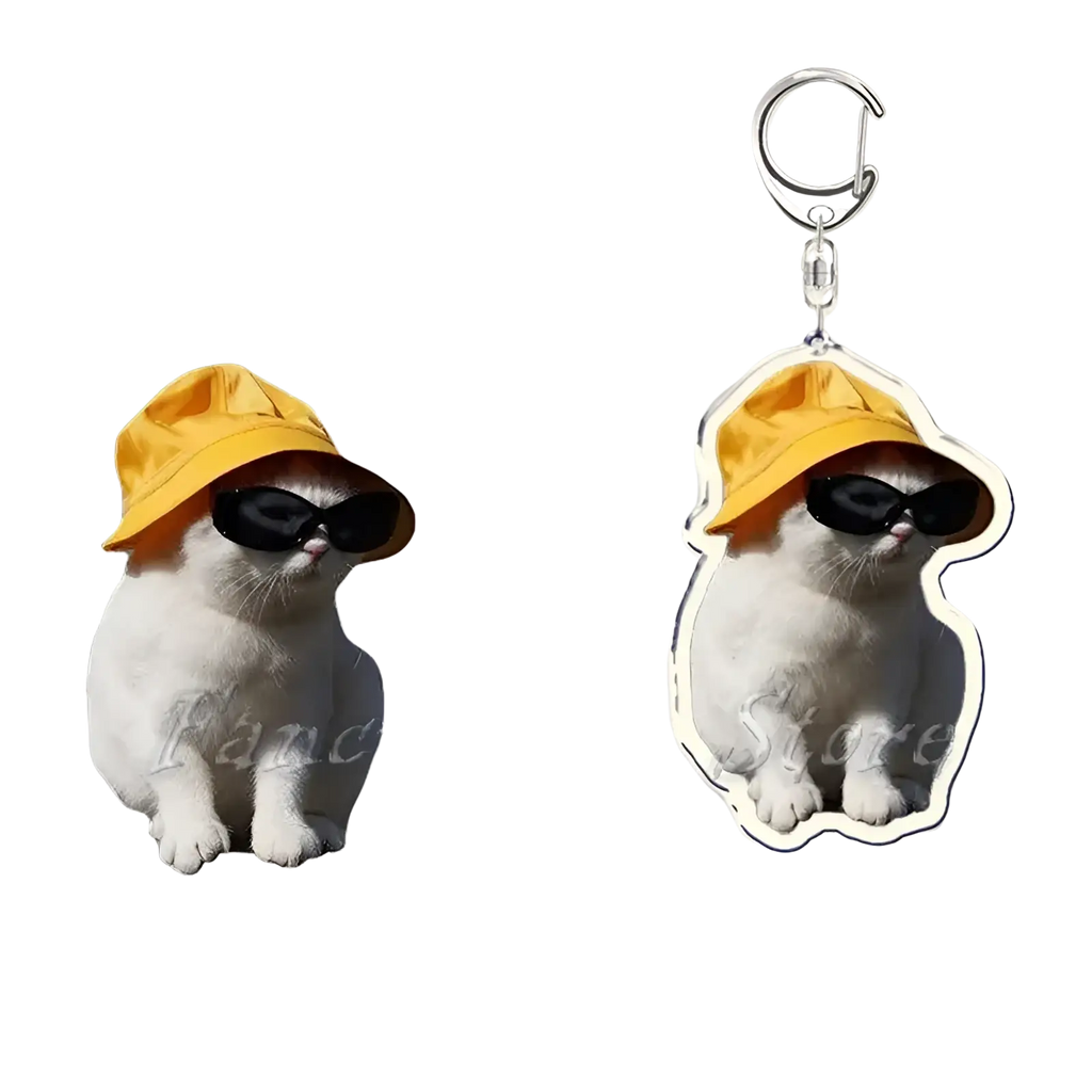Clear acrylic custom photo keychain featuring a white cat wearing a yellow bucket hat and black sunglasses