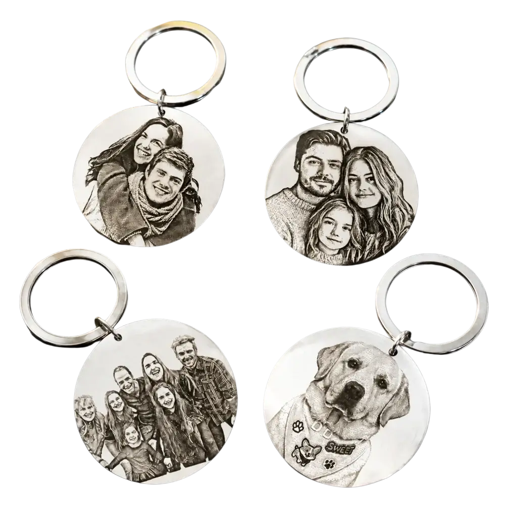 Silver stainless steel round custom photo keychains featuring engraved black and white family and dog portraits