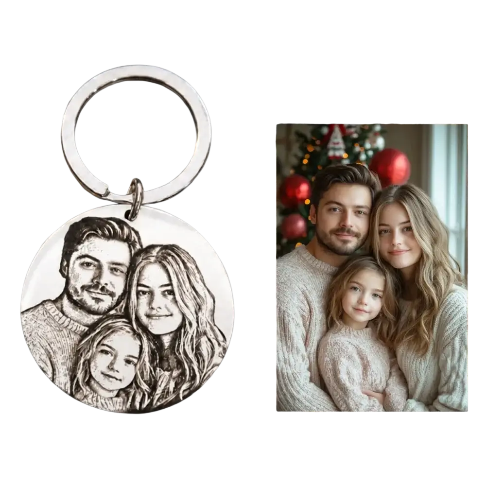 Silver circular stainless steel keychain with finely engraved black and white family portrait pendant