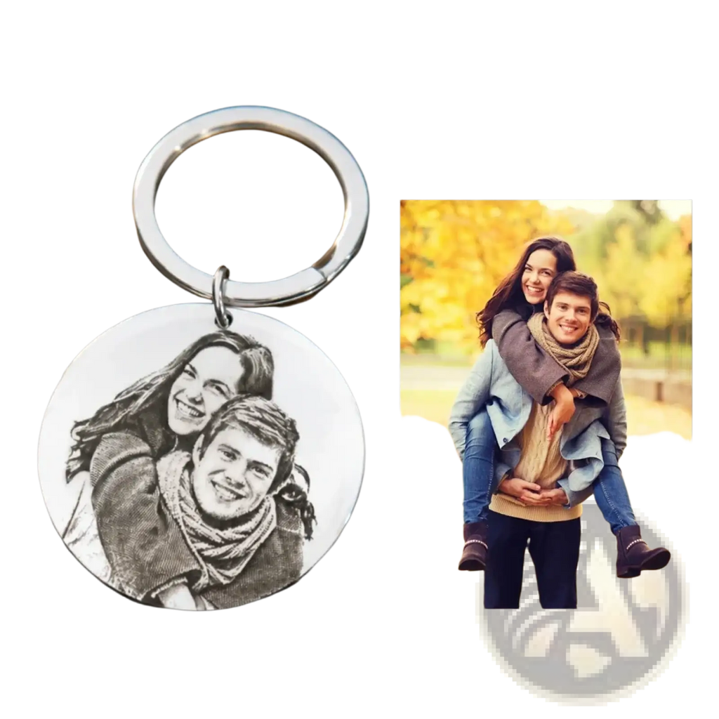 Silver circular stainless steel keychain with black and white engraved portrait of two smiling people custom photo pendant