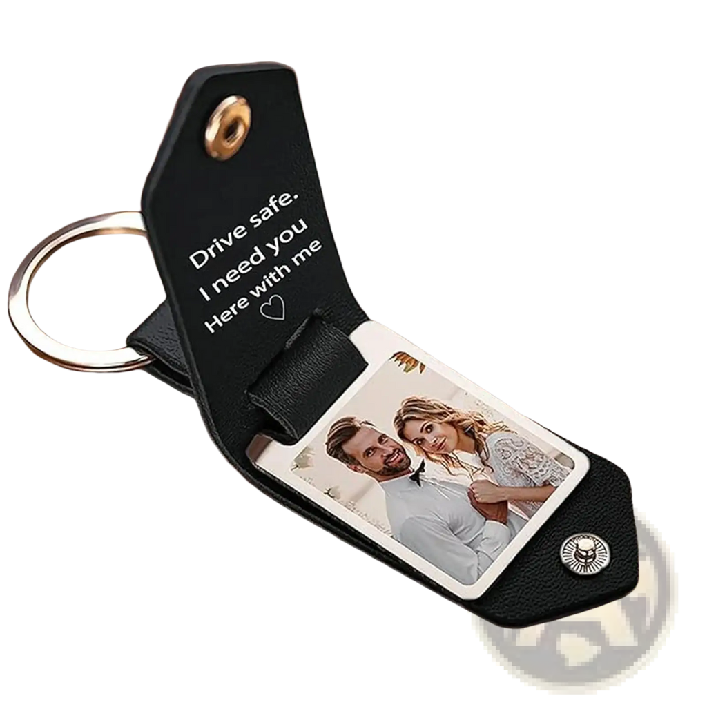 Custom photo leather keychain in black with silver metal ring, skull button, engraved message, and photo insert