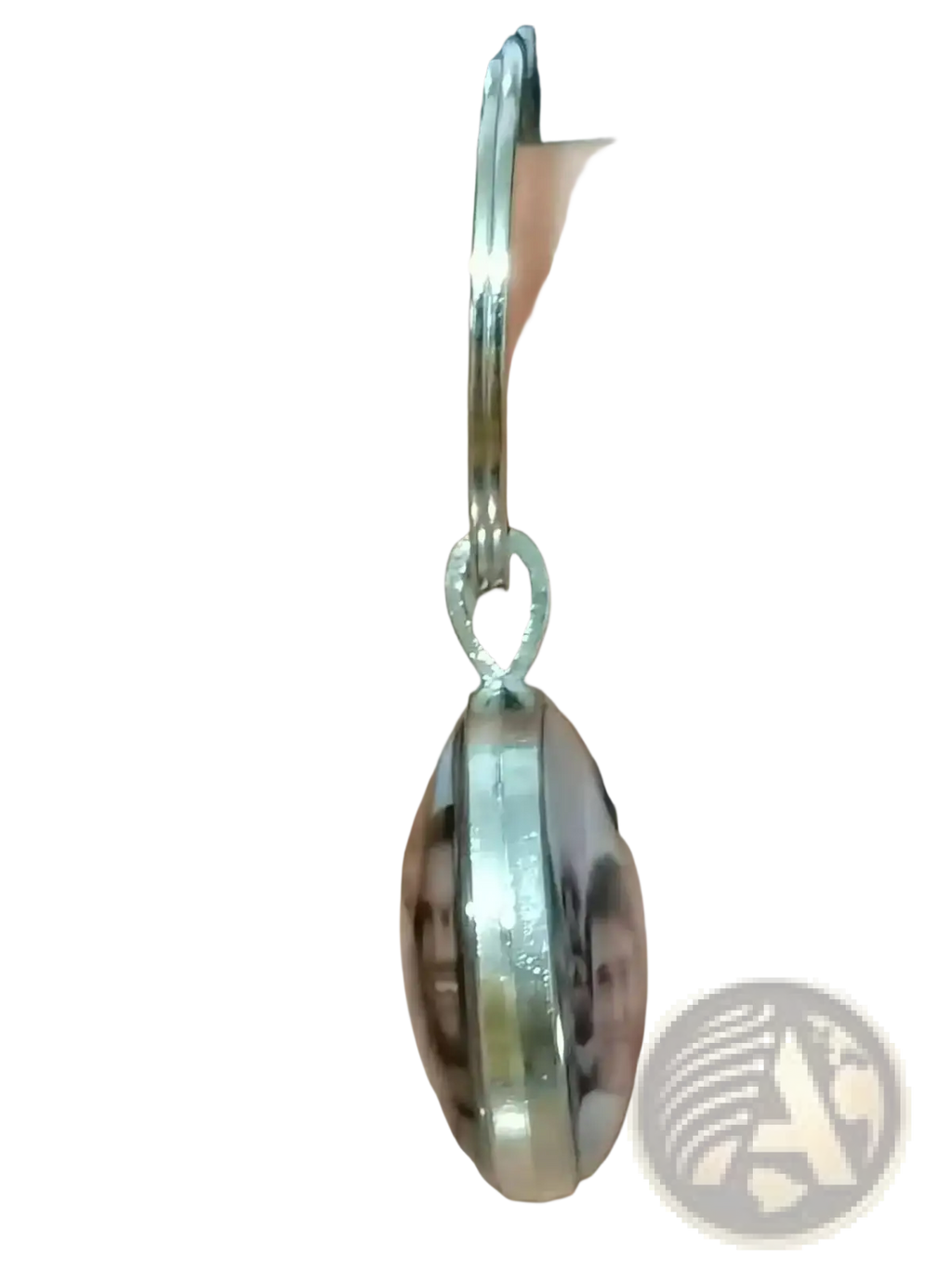 Custom photo logo silver keychain with polished metallic finish and clear rounded face in an oval shape