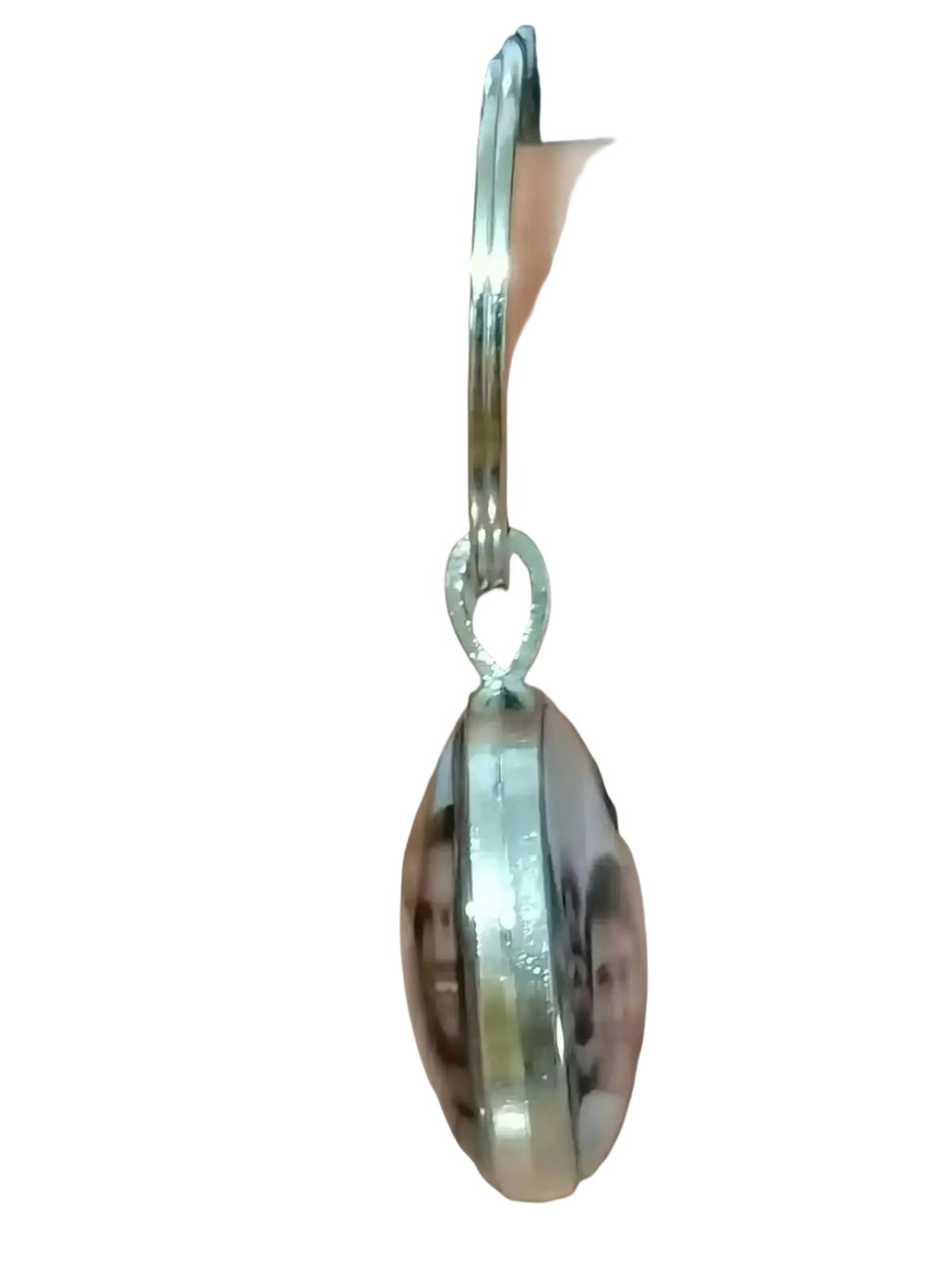 Custom photo logo silver keychain with polished metallic finish and clear rounded face in an oval shape
