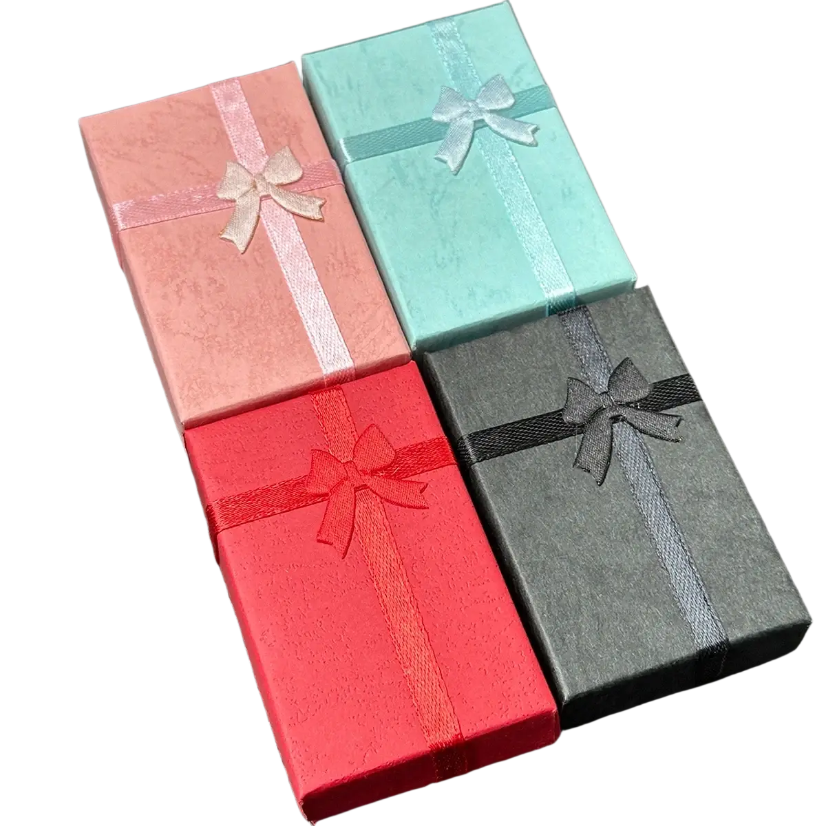 Four rectangular custom photo projection keychain gift boxes in pink teal red and gray with matching satin ribbons and bows