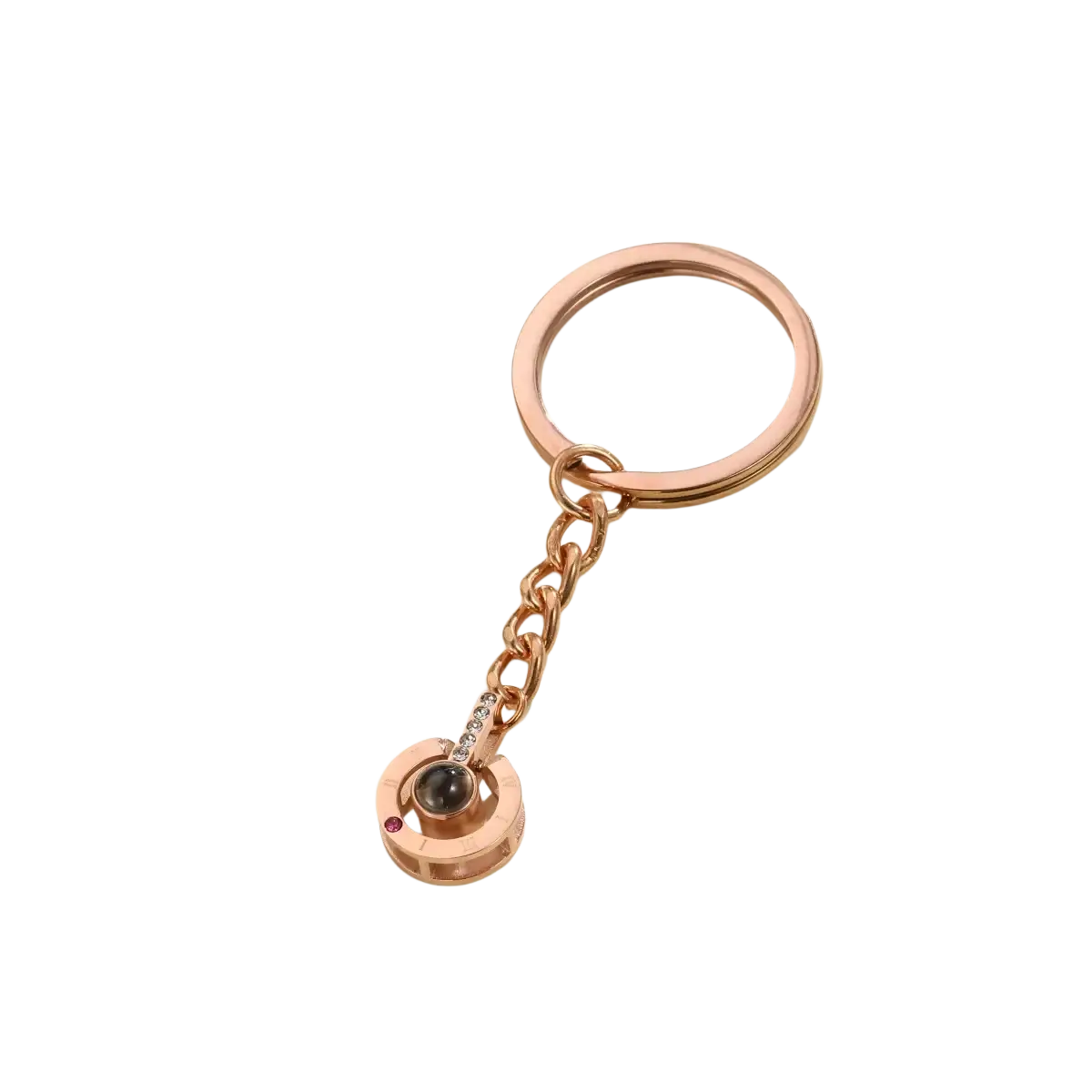 Rose gold custom photo projection keychain with circular pendant, black sphere, and clear crystals for memorial gift
