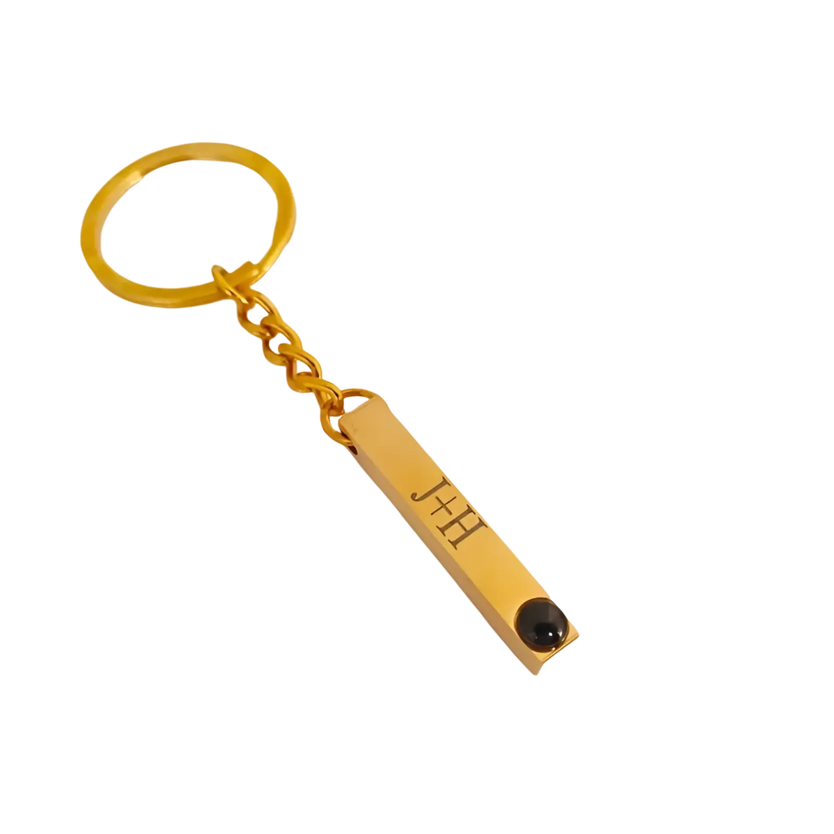 Gold-colored metal custom photo projection keychain with engraved rectangular bar and black gemstone accent