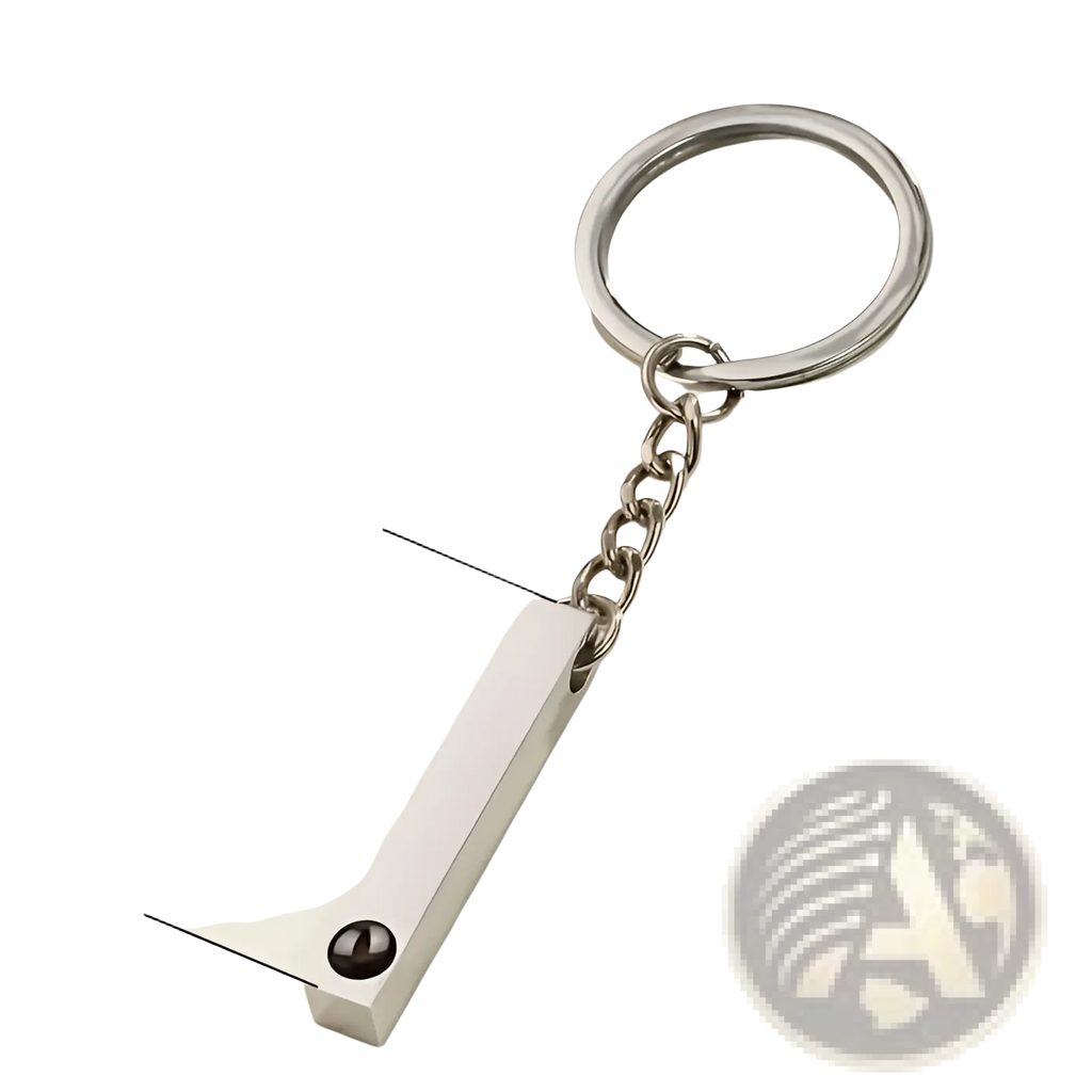 Silver rectangular custom photo projection keychain with polished metal finish and black circular accent personalized gift