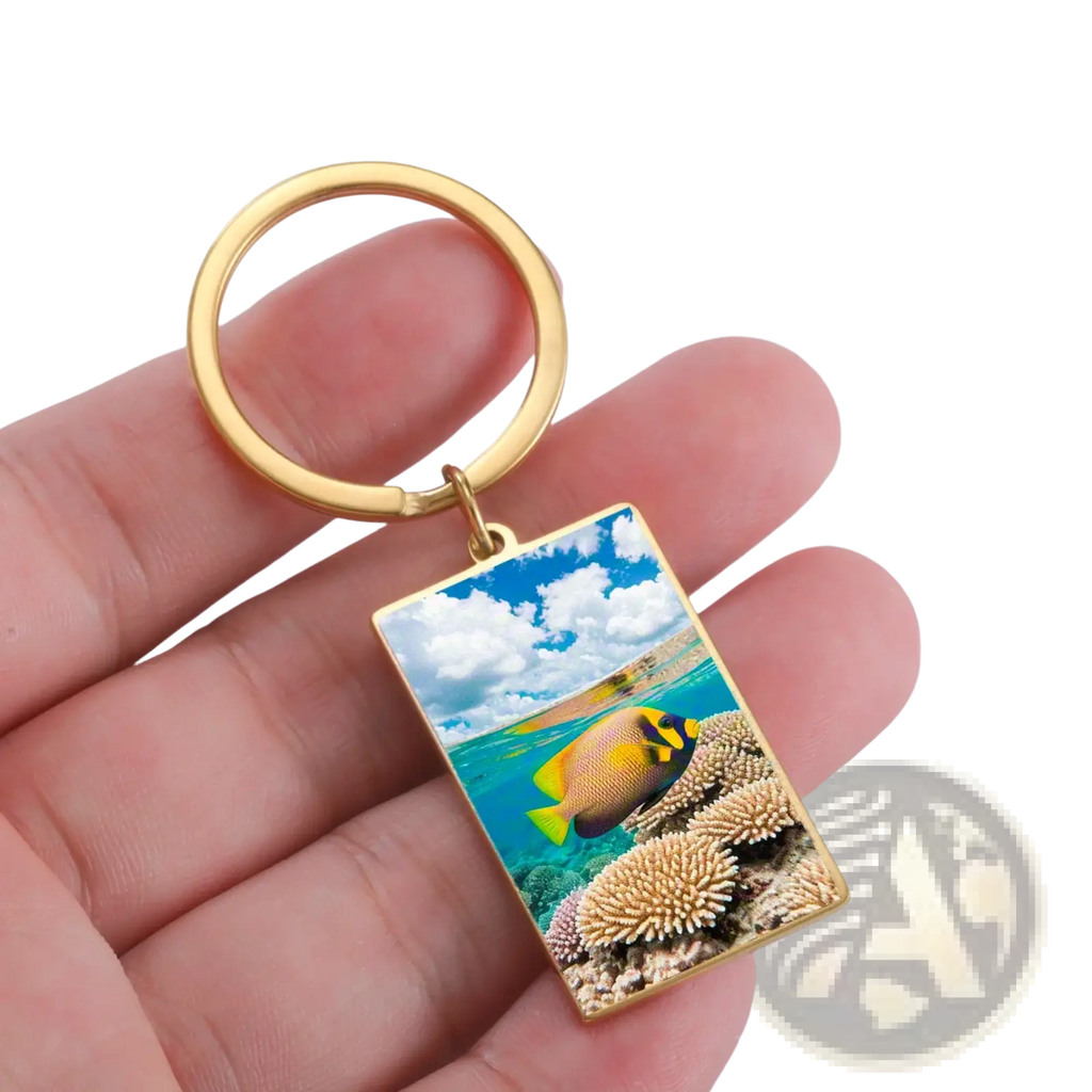 Gold-colored custom photo rectangle keychain with vibrant underwater scene on stainless steel ring accessory