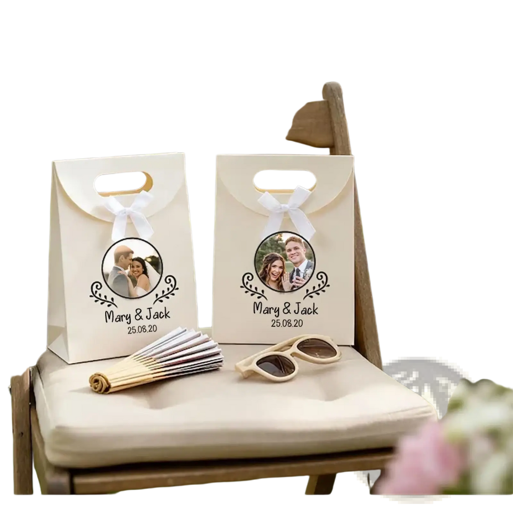 Cream-colored paper custom photo wedding favor bags with white ribbon bows and personalized couple prints mary and jack 25.08.20