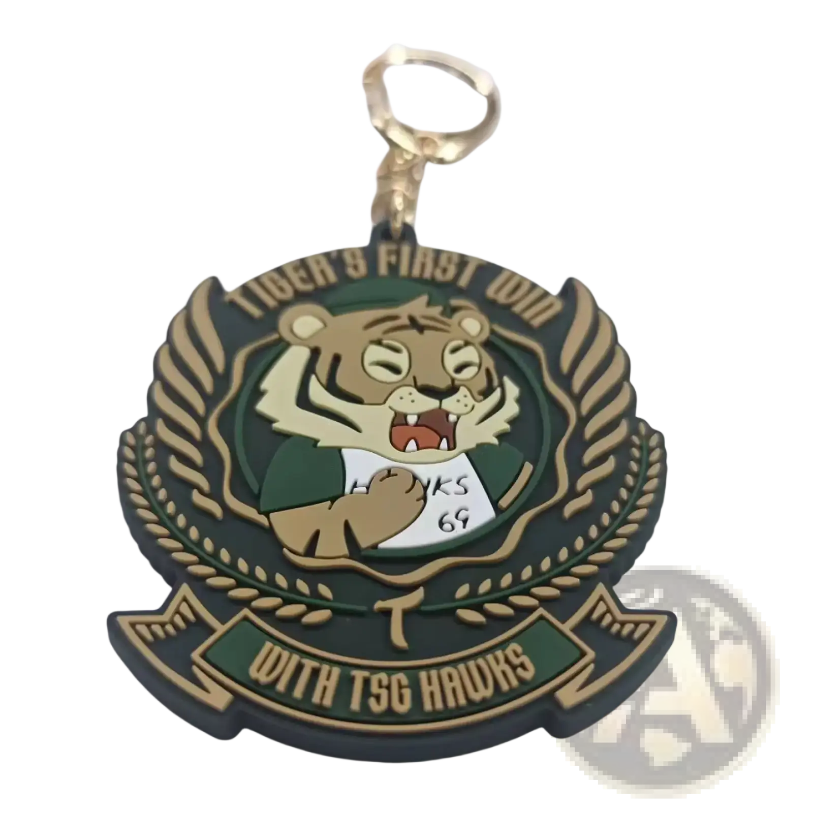 Green and gold custom PVC rubber keychain with cartoon tiger mascot in green jersey and laurel wreath design