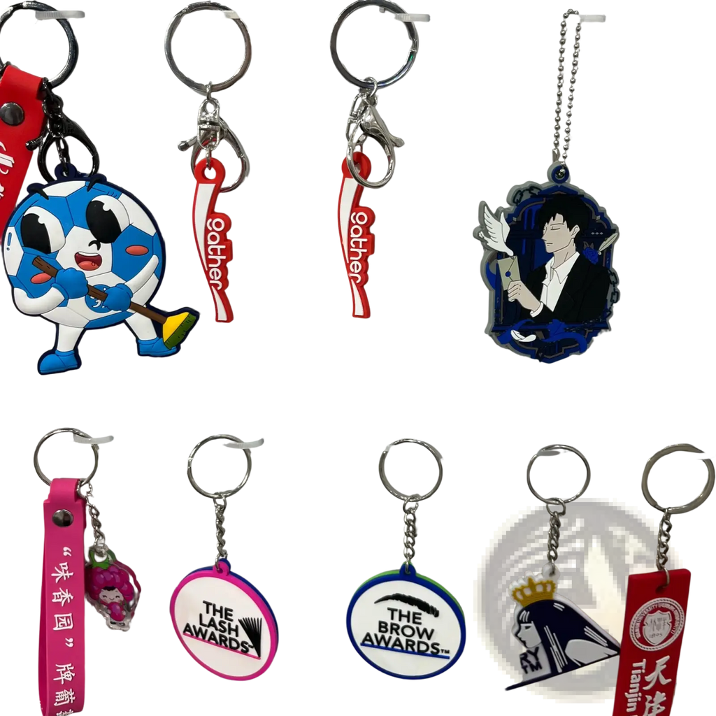 Custom PVC keychain featuring a blue and white cartoon character with black eyes holding a broom rubber logo key ring