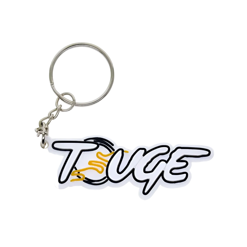 Custom soft PVC keychain featuring a white and black touge logo with yellow flame design and silver metal ring and chain