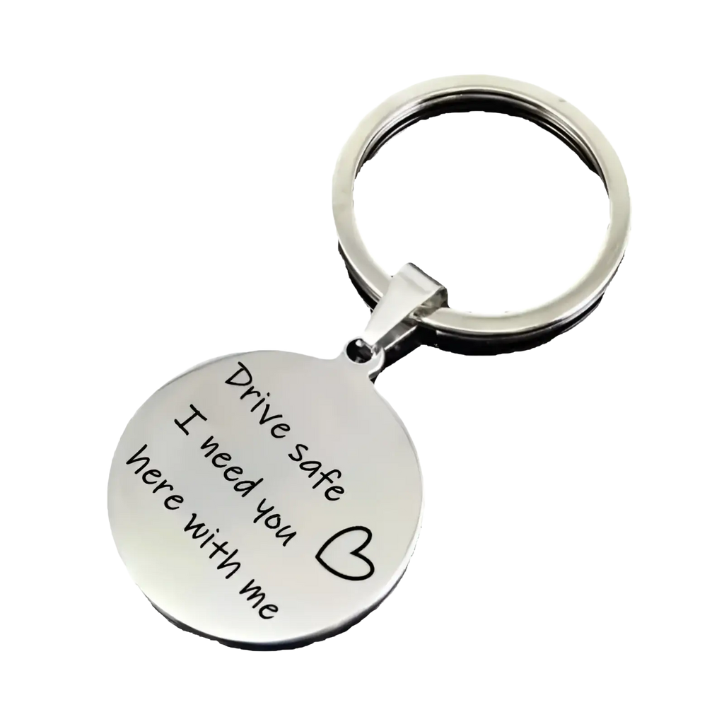 Silver circular sterling silver drive safe engraved keychain with message drive safe i need you here with me and heart symbol