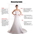 White strapless satin wedding gown with fitted bodice and flowing a-line floor-length skirt for custom bridal wear