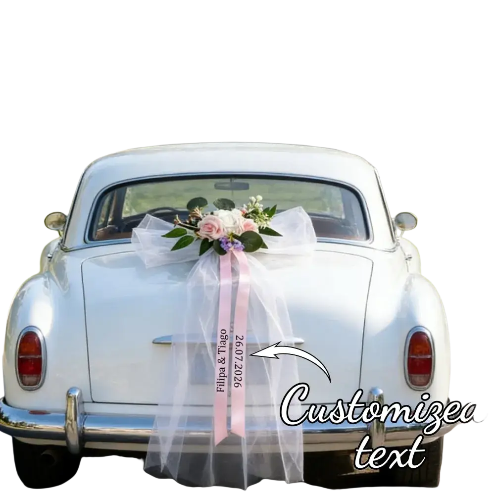 A delicate pink satin ribbon with a sheer white tulle bow and custom engraved text for a wedding floral garland set