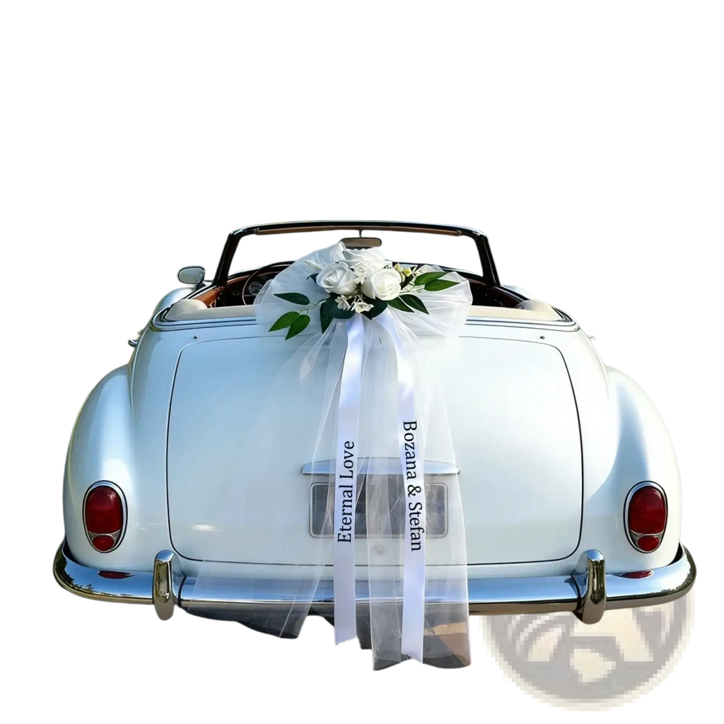Back view of a white convertible car decorated with a custom wedding car floral garland and sheer ribbon set