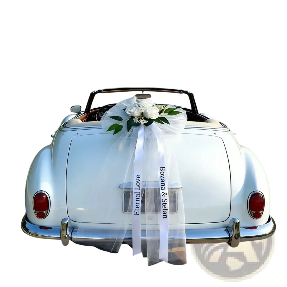 Back view of a white convertible car decorated with a custom wedding car floral garland and sheer ribbon set