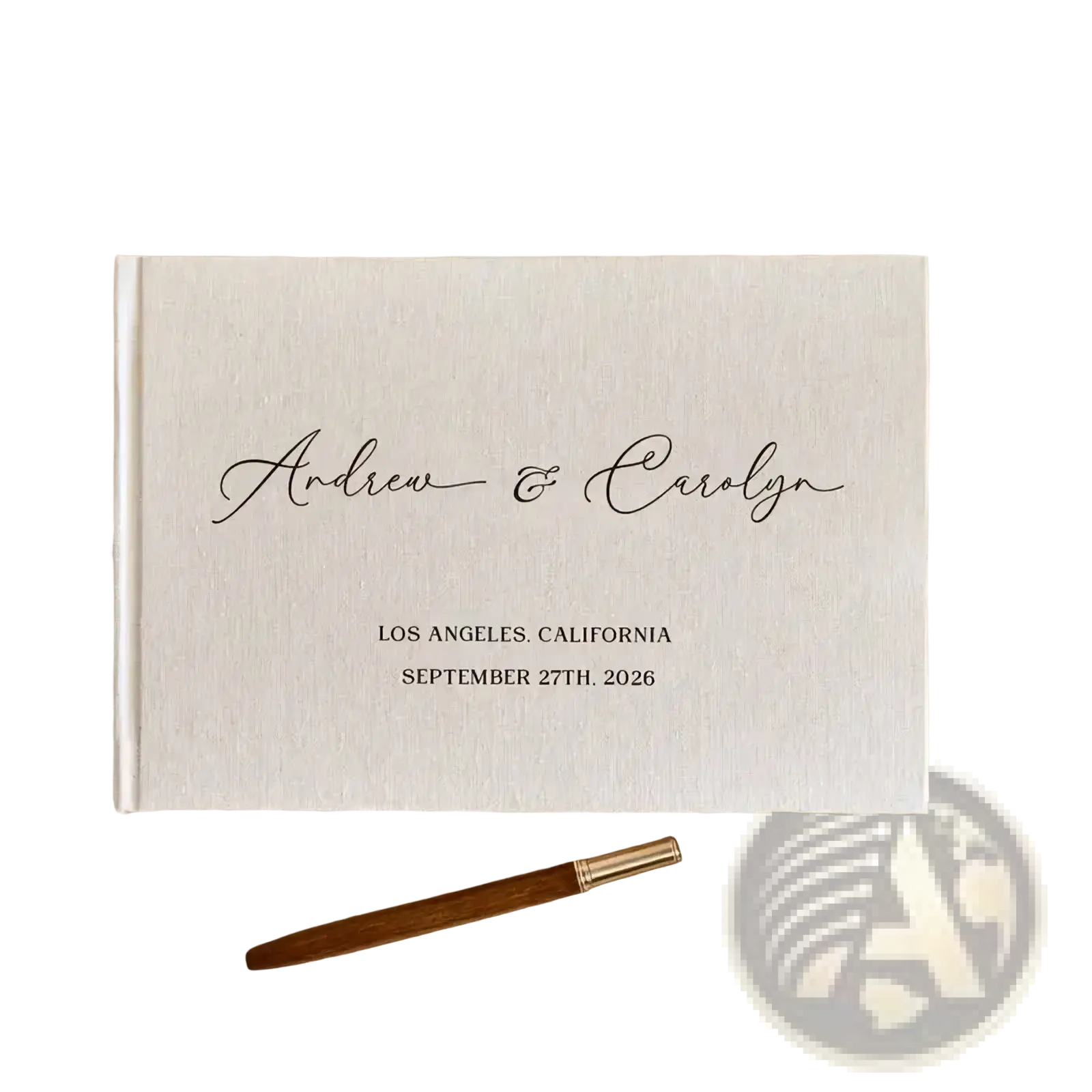 Cream-colored linen-bound custom wedding guest book with black cursive engraving and matching wooden pen photo album