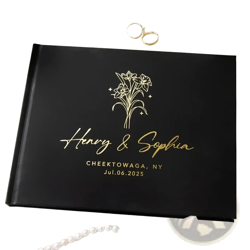 Custom wedding guest book personalized black leather bound with gold foil floral design henry and sophia wedding details