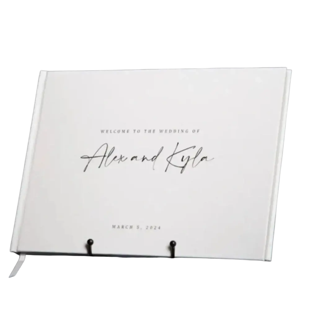 Custom wedding guest book with minimalist white hardcover elegant black cursive script and subtle ribbon bookmark