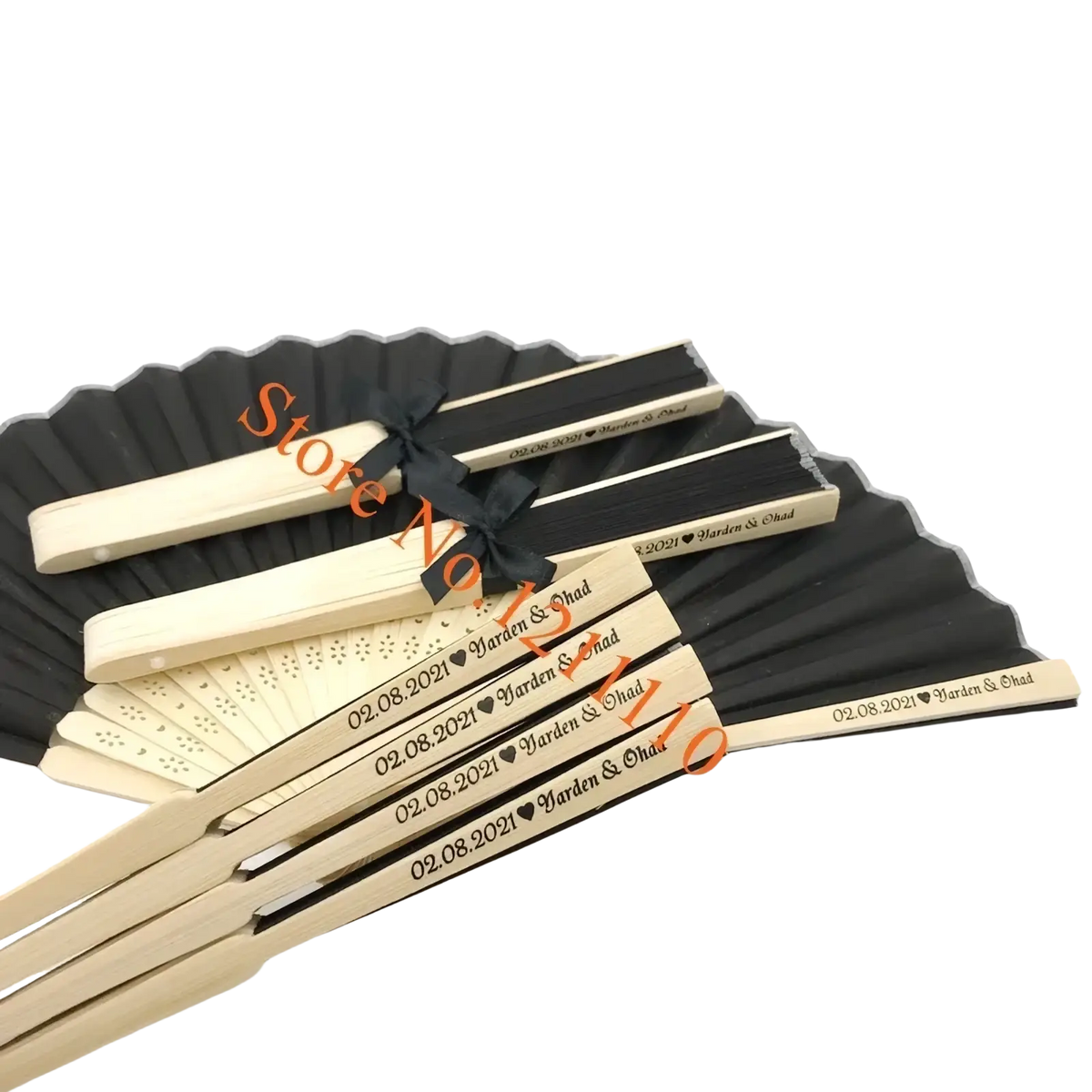 Black and cream folding bamboo silk wedding hand fans with engraved names and dates tied with a black ribbon