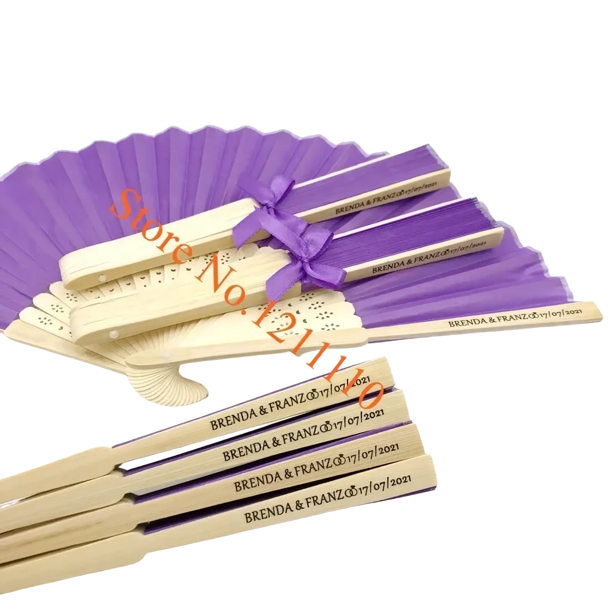 Custom wedding hand fans in purple and cream bamboo with laser-engraved details tied by a matching purple ribbon