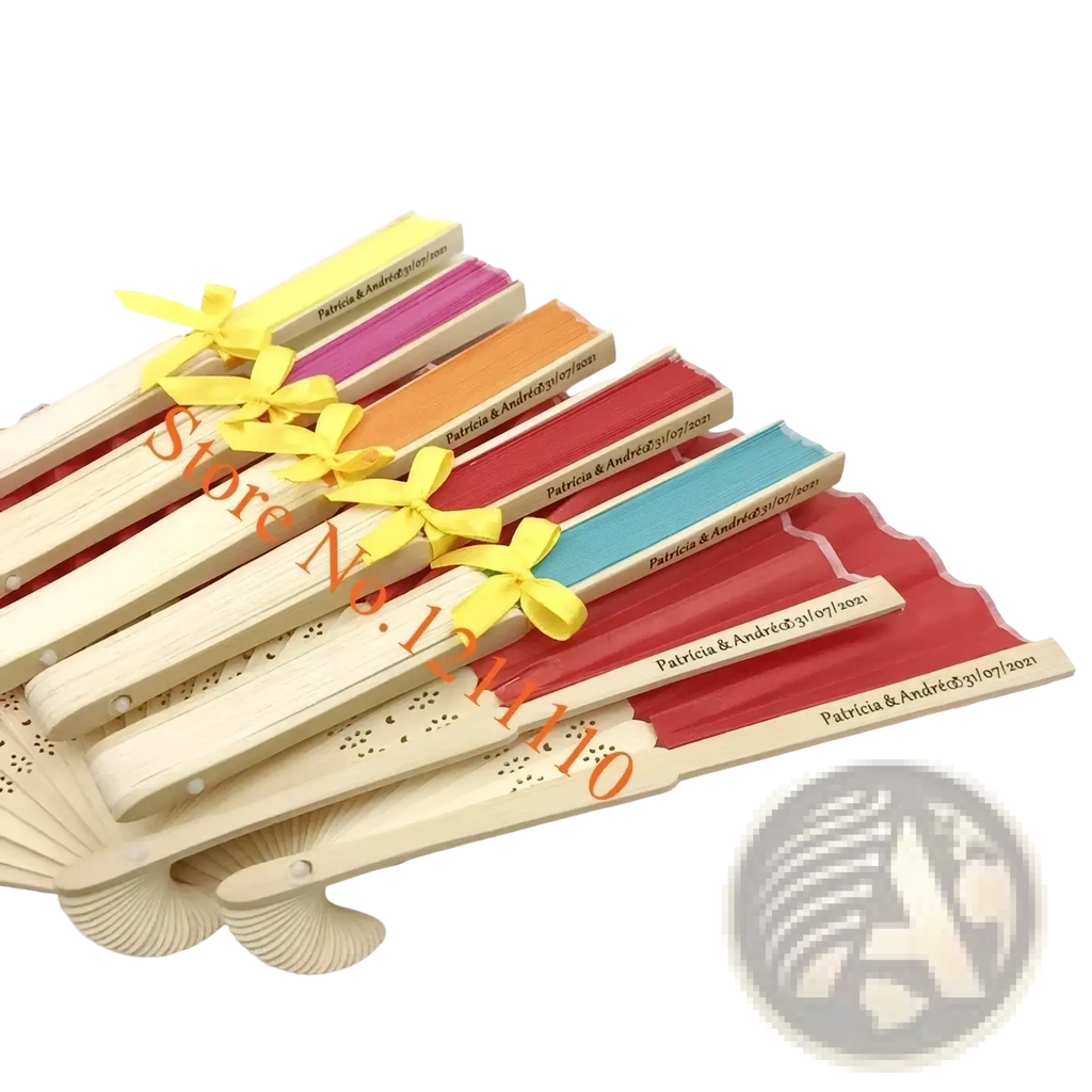 A set of colorful wooden folding fans with personalized engravings tied with yellow ribbons for custom wedding favors