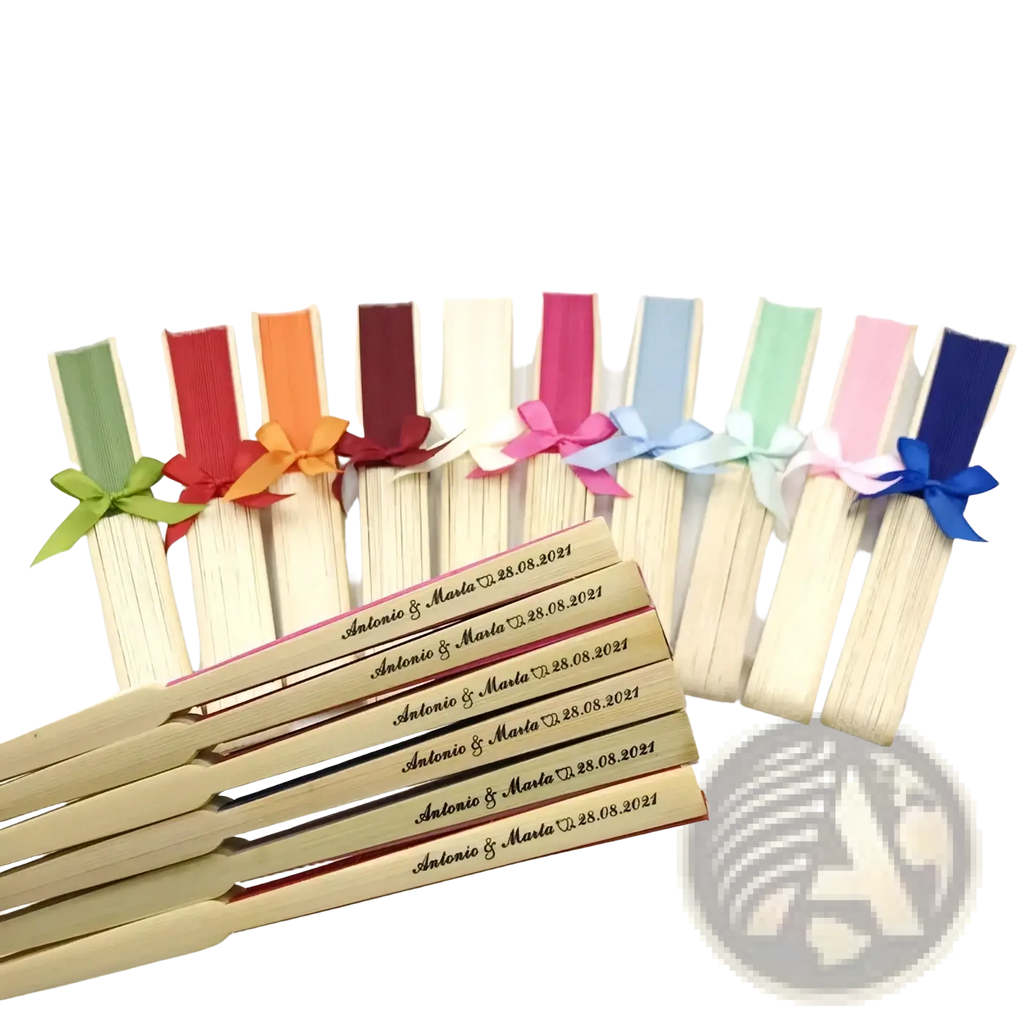 A set of wooden folding fans with colorful satin ribbon bows engraved with personalized wedding details