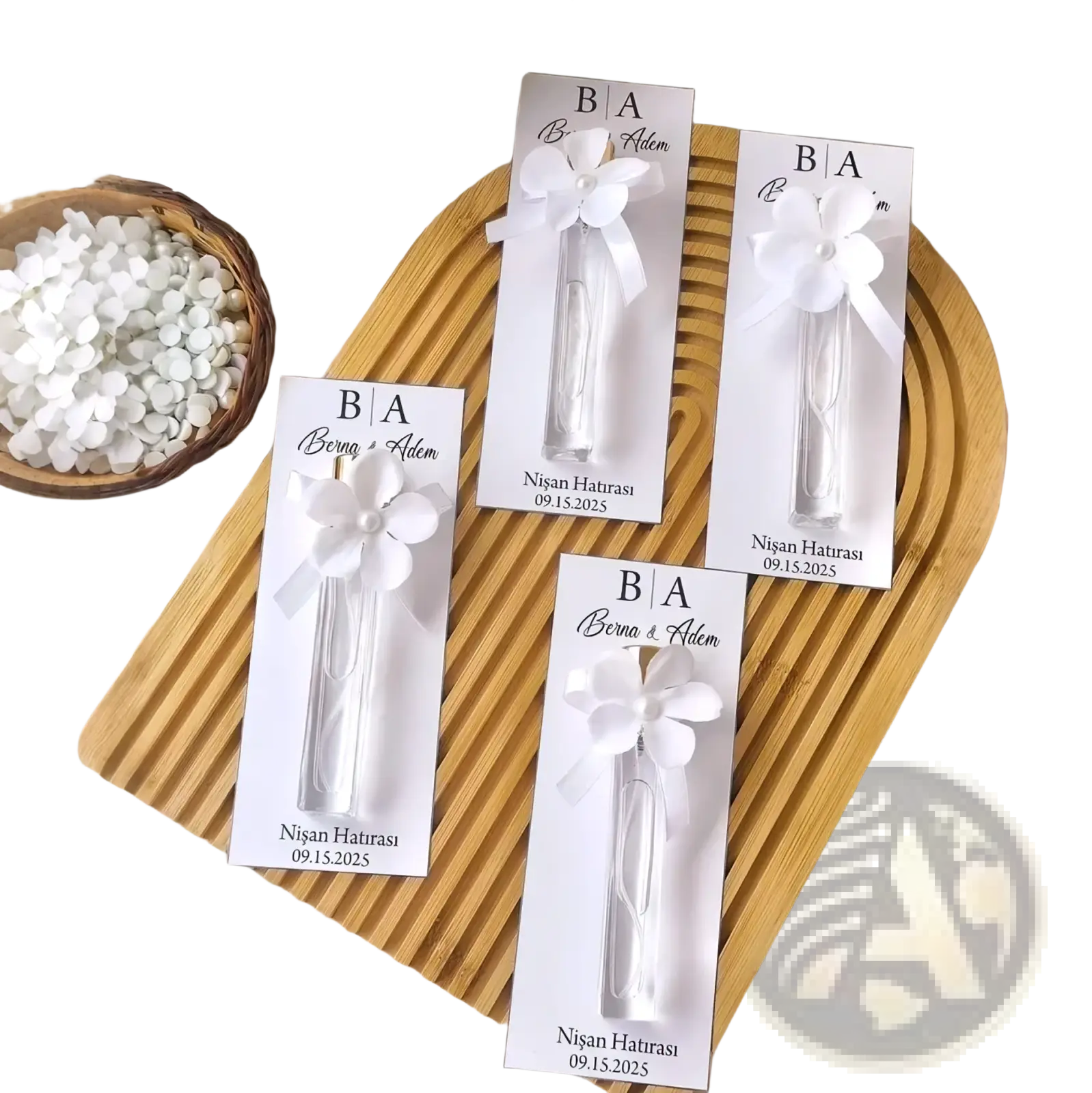 Custom white floral-themed wedding perfume favor bottles with personalized gift cards and ribbon ties for elegant presentation