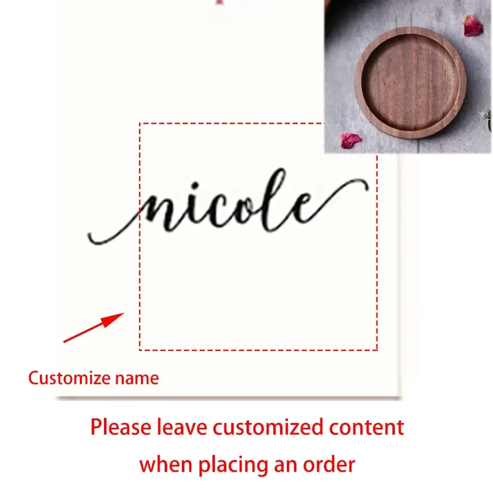 Custom wood ring dish with engraved wedding ring holder and customizable white name card in black cursive script