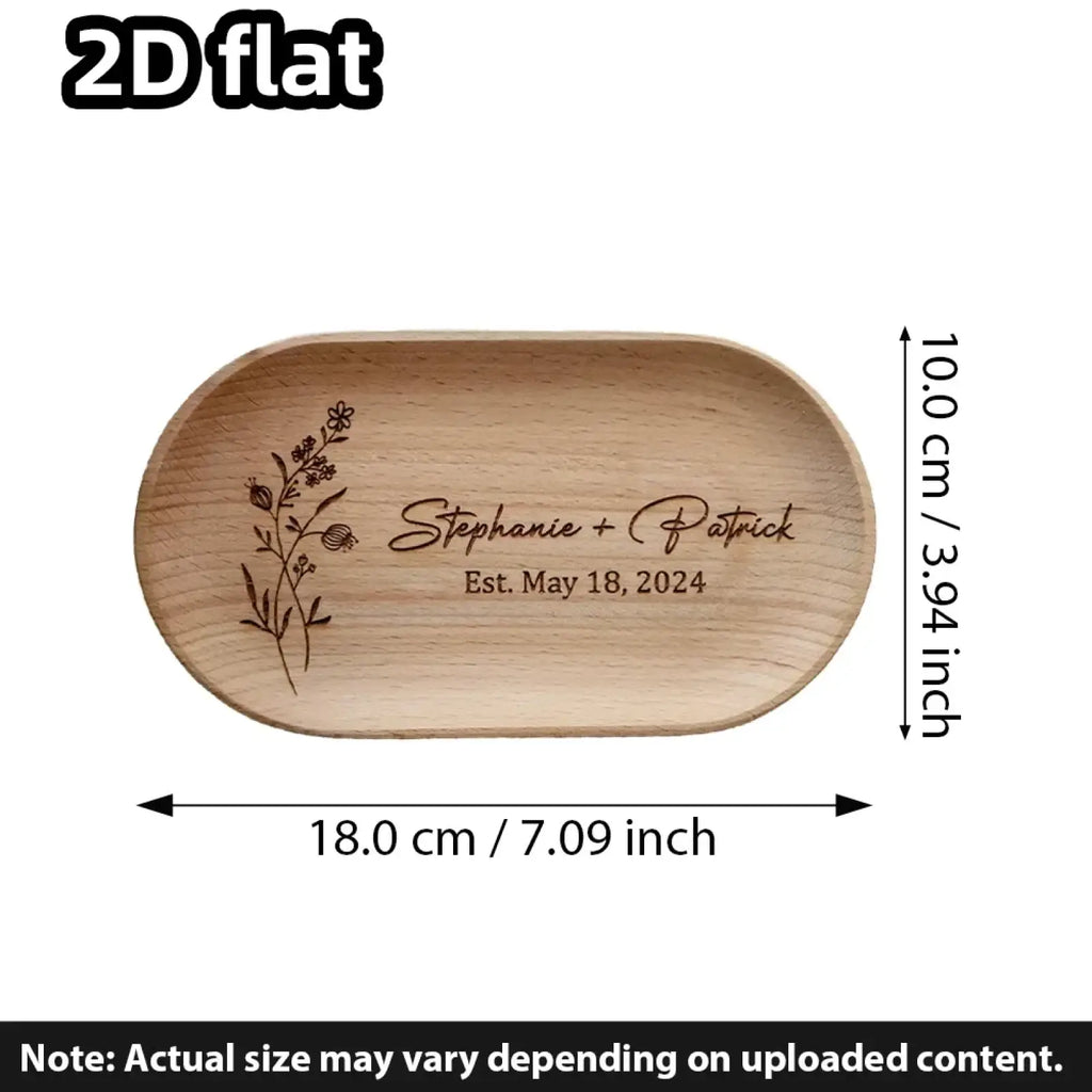 Light brown wooden oval tray engraved with floral design personalized with names stephanie patrick and date est
