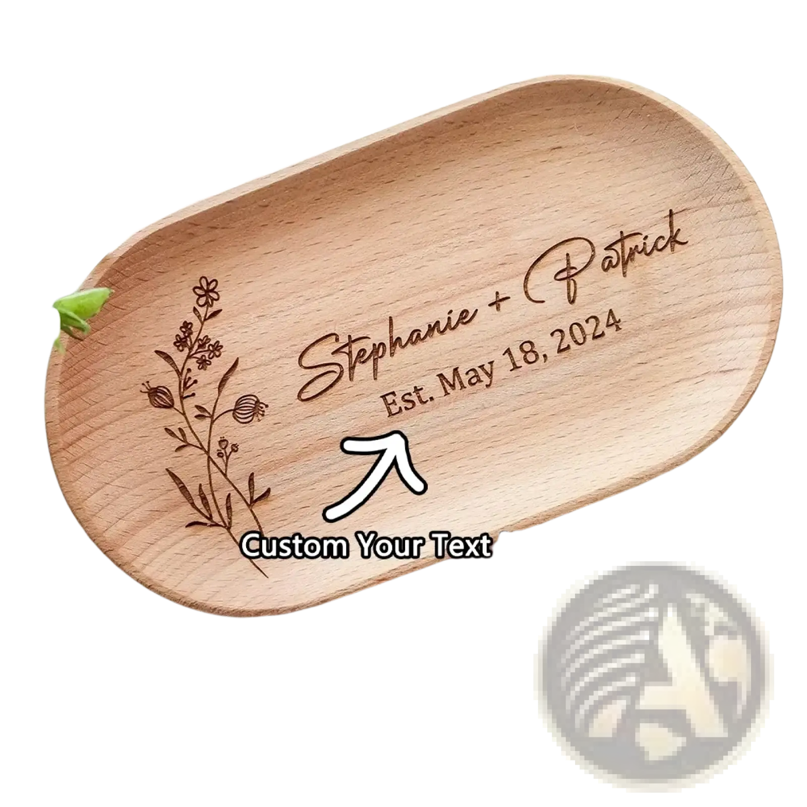 Light brown wooden oval ring dish engraved with floral design and personalized names as a couple keepsake