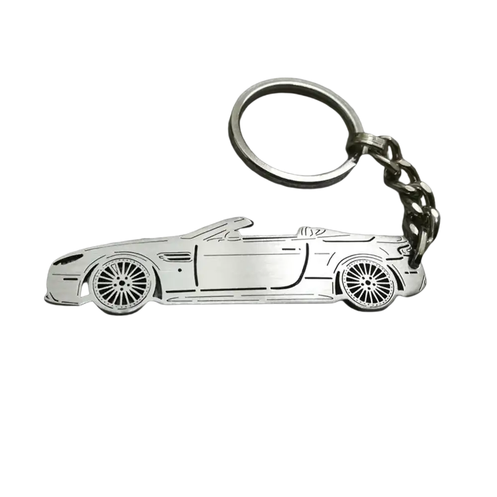 Silver metallic customized car model metal keychain shaped like a convertible sports car with detailed wheels and body lines