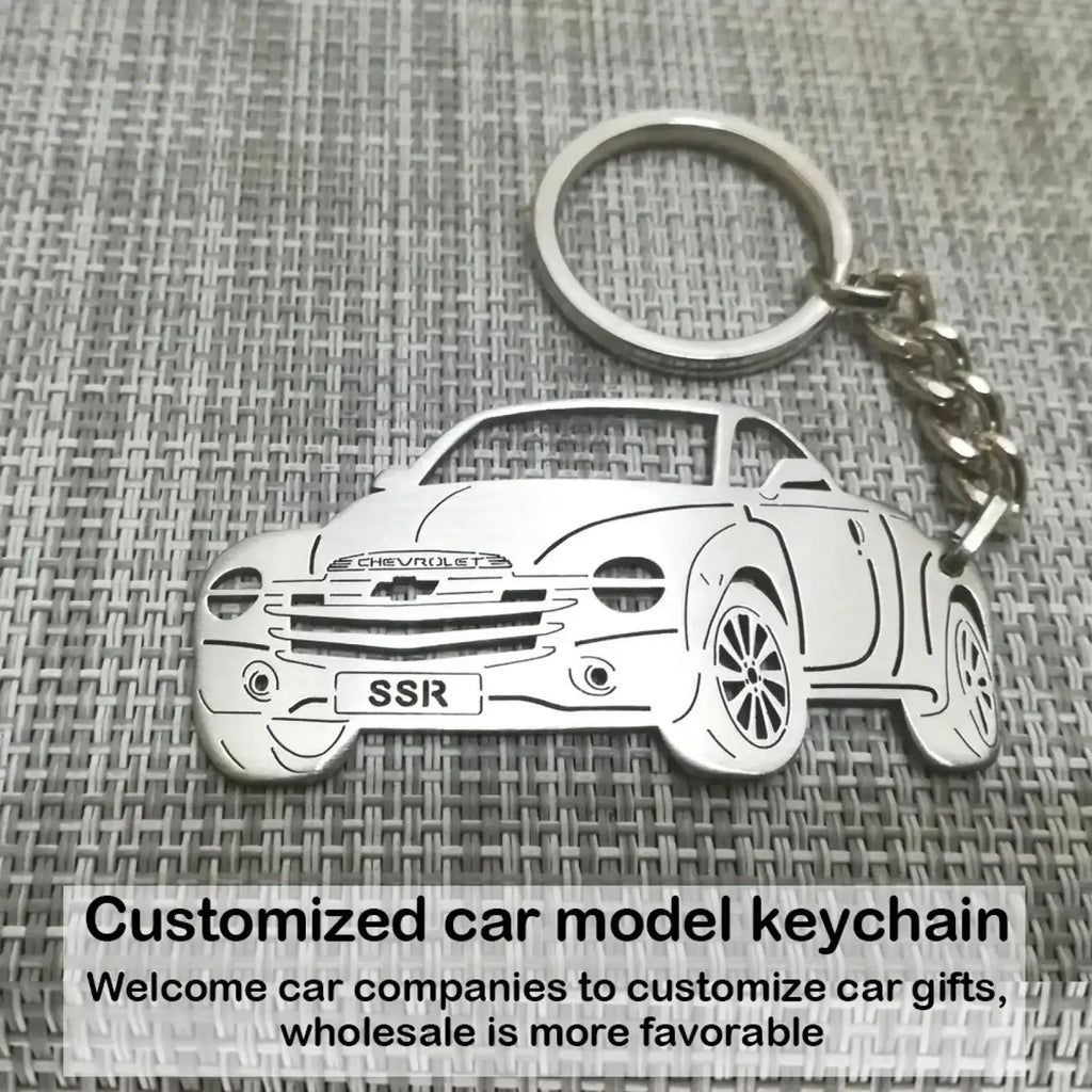 Customized car model metal keychain silver metallic chevrolet ssr design with detailed outline and chrome chain attachment