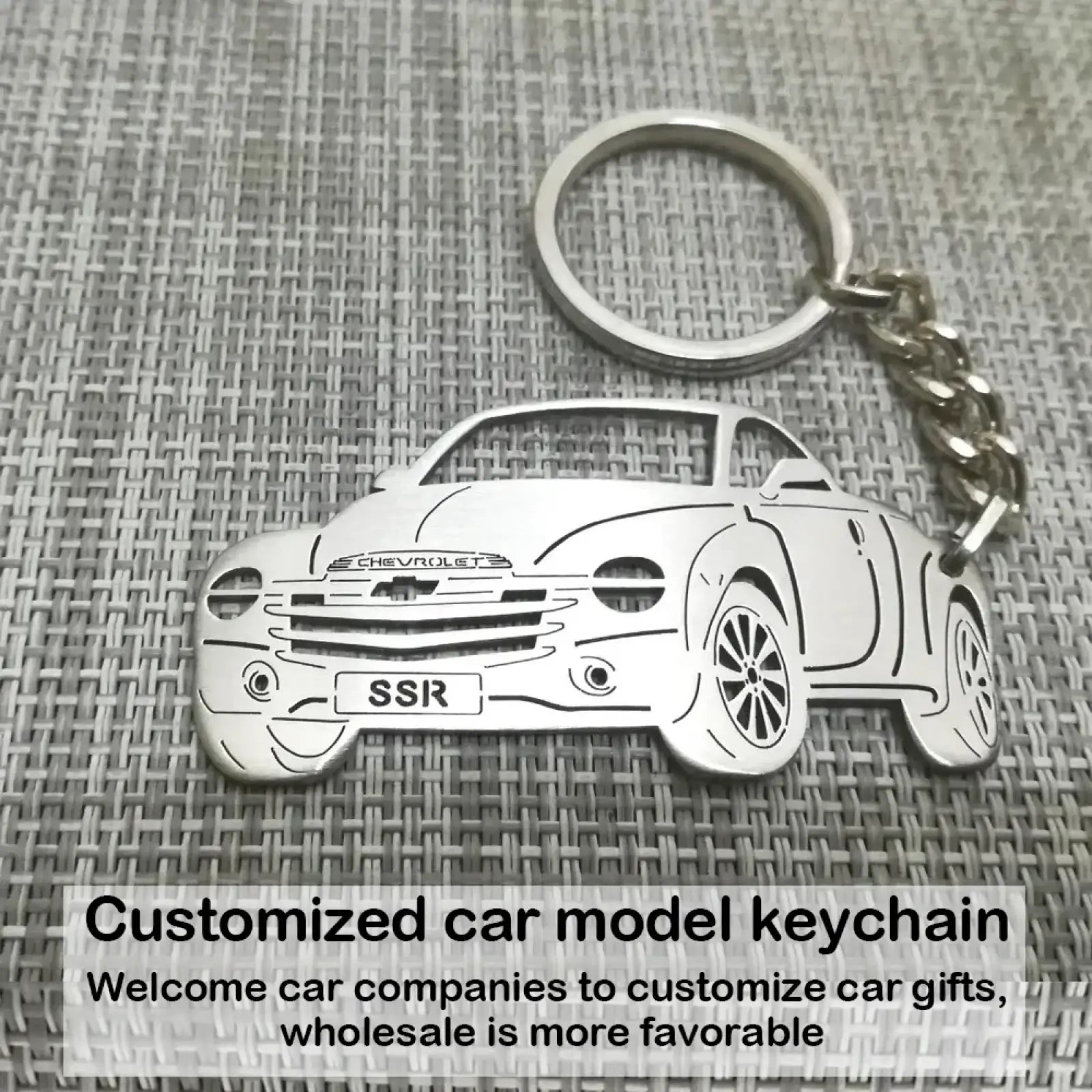 Customized car model metal keychain silver metallic chevrolet ssr design with detailed outline and chrome chain attachment
