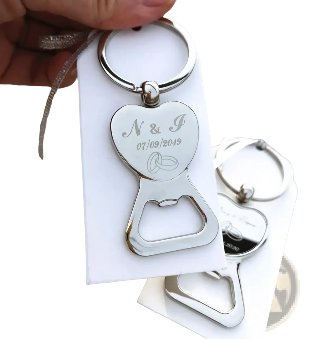 Silver heart-shaped metal bottle opener keychain with engraved initials and wedding date for customized wedding favors