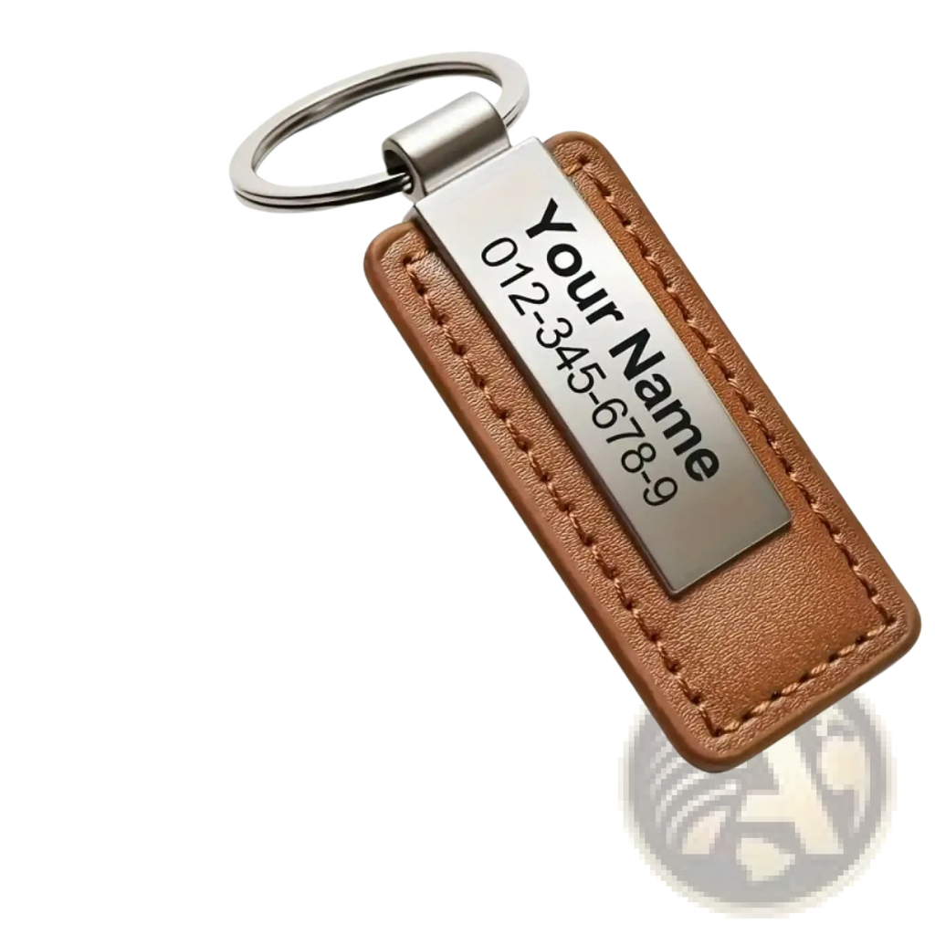 Customized leather keychain in brown with an engraved stainless steel id tag displaying name and phone number