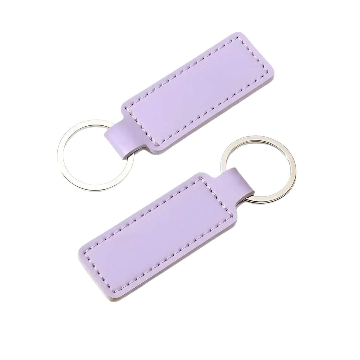 Customized leather keychain set featuring a lavender leather key fob with stitched edges and silver-toned metal ring
