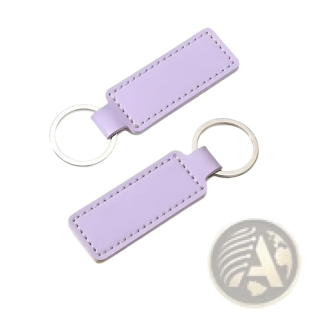 Customized leather keychain set featuring a lavender leather key fob with stitched edges and silver-toned metal ring