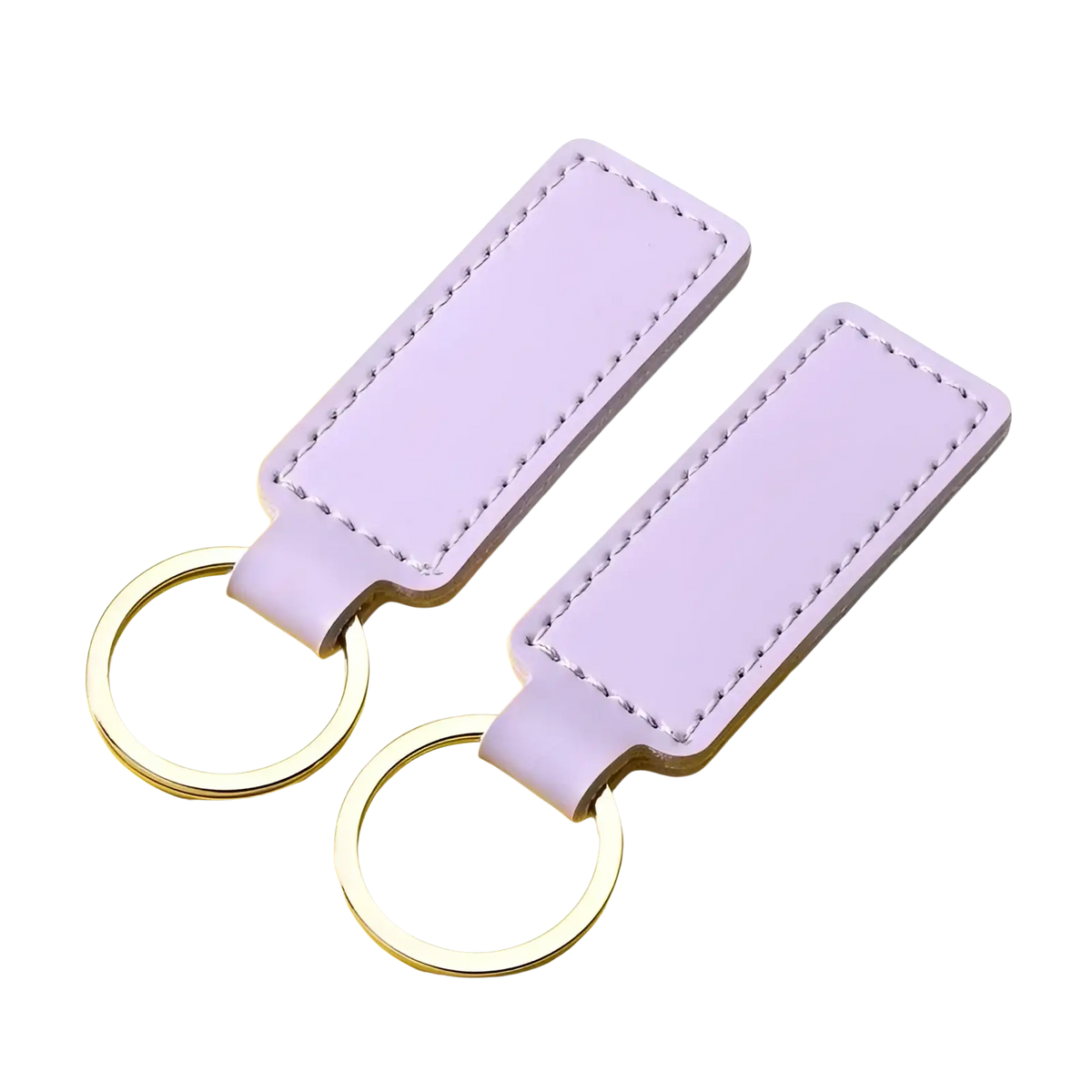 Customized leather keychain set featuring lavender leather with silver-toned metal rings and neat edge stitching