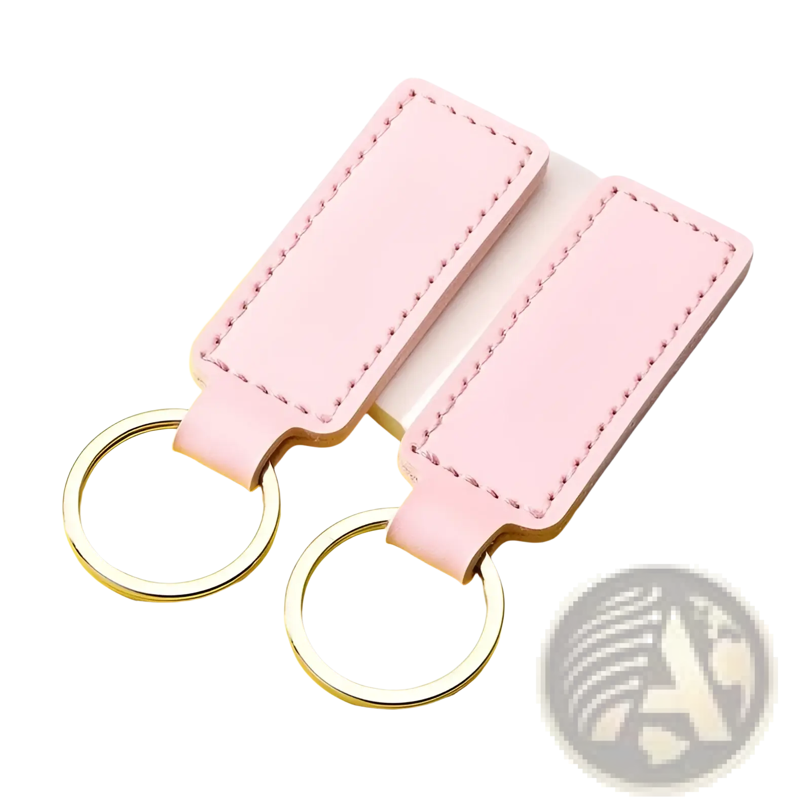 Pink rectangular leather keychains with silver toned metal rings in a customized leather keychain set