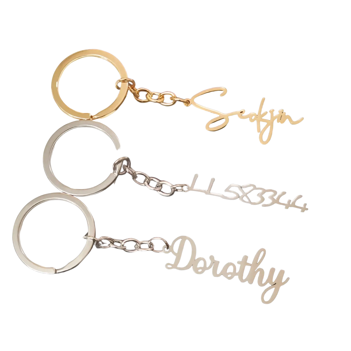 Customized name keychain set featuring gold and silver metal keychains with elegant cursive personalized lettering
