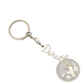Silver metallic customized name keychain set featuring a dorothy engraving in cursive attached to a circular ring